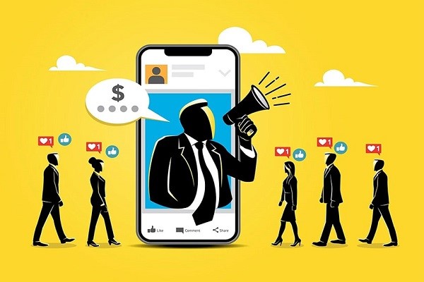 تصویری انیمیشنی از یک گوشی تلفن همراه بزرگ که مردی با بلندگو از صفحه آن بیرون زده و در اطراف گوشی چند نفر ایستاده‌اند که روی سر آن‌ها نماد لایک قرار دارد. 